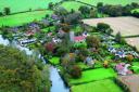 An aerial view of the Broads village of Belaugh, which sits next to the River Bure
