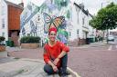 Artist Sofia Camacho in front of her finished street art Butterfly's Metamorphosis in Havelock Road/St Peter's Road, Great Yarmouth as part of a Reprezent Project scheme Picture: Davide De Almeida