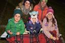 The Clements family enjoying the low bang firework display at Wroxham Barns - the first night is cancelled this year due to Storm Ciarán Picture: Sonya Duncan