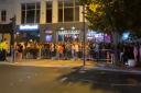 People queue up for Bar and Beyond in Norwich on Saturday night.