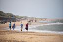 Holidaymakers enjoy the warm weather at Sea Palling beach  Picture : ANTONY KELLY