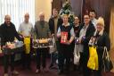 Staff from Great Yarmouth and Waveney Mind donating hampers to the Salvation Army. Picture: Great Yarmouth and Waveney Mind