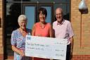 Elsie Hall (left) and Brian Hall (right) with James Paget Hospital charity co-ordinator Maxine Taylor (centre).
