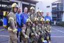 Norfolk firefighters ready to start their 100 miles walk in aid of Norfolk and Waveney Mind, and the Firefighters charity, in full PPE including the breathing apparatus sets