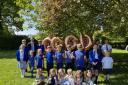 Pupils at Filby Primary School celebrate the good rating from Ofsted