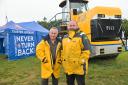 Dick and Richard Thurlow in front of Caister Lifeboat's new £250k tractor at the Royal Norfolk Show. Picture - Sonya Duncan