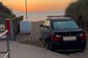 A BMW was found abandoned on Hemsby beach at sunrise