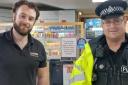 An Ormesby Spar employee with PC Martin who has been visiting shops in the lead-up to Halloween.