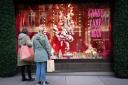Shoppers on Oxford Street, central London, as the Christmas shopping period begins for retailers (James Manning/PA)