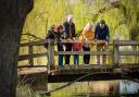 A family enjoying a day out at Pensthorpe Natural Park.