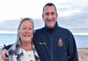 Sue Weaver (pictured with Hemsby Lifeboat coxswain Daniel Hurd) has raised £30,000 for the Lifeboat in 2023. Picture - Newsquest
