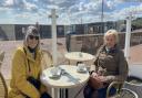 Vivienne George and Mary Brown, old school friends from Caister, enjoy a cuppa by the sea on Monday April 12. Gorleston's Pier Hotel was a popular spot for a morning brew in the sunshine.