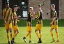 Beccles celebrate their third goal against Acle in a match which ended all square at 3-3. Picture: ANTONY KELLY