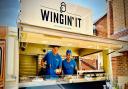 Kyle Crux and Zach Pieri have launched a new food truck serving up chicken wings with flavours from around the world