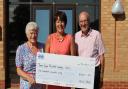 Elsie Hall (left) and Brian Hall (right) with James Paget Hospital charity co-ordinator Maxine Taylor (centre).