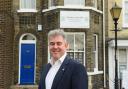 Brandon Lewis outside his Great Yarmouth office