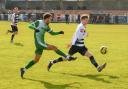 Gorleston's Nathan Stewart crosses the ball against Tilbury