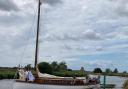 The Bishop of Norwich heads on the wherry to St Benet's Abbey