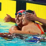 Jessica-Jane Applegate, left, and Northern Ireland's Bethany Firth celebrate at the end of the women's 200m freestyle S14