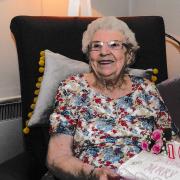 Mary Howarth seen with her 100th birthday cake