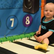 Leo Newson-Smith, 15-months-old, enjoying on the floor piano in the new soft play area at the Jump Warehouse, Great Yarmouth.