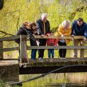 A family enjoying a day out at Pensthorpe Natural Park.