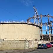 The Victorian gasholder is seen behind the 1960s equivalent on Admiralty Road
