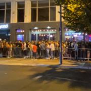People queue up for Bar and Beyond in Norwich on Saturday night.