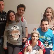 Leanne and her family with her mum Lorraine at St Elizabeth Hospice.