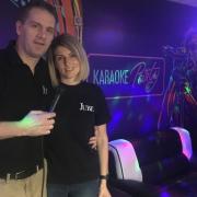 Bradley Fish and his partner Laura in the karaoke booth at The Jube. He has seen electricity bills soar and is calling on the Government to take action Picture: Liz Coates