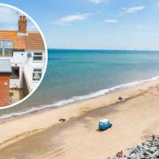 Two-bed cottage with sky lounge and coastal views goes up for sale