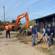 A digger has started the relocating process of Lane Martin's Hemsby home. Picture - James Weeds