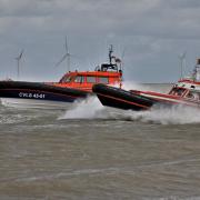 CHANGING OF THE GUARD: Caister Lifeboat's new Medina-class vessel (left) was shown in the water beside its existing craft, the Bernard Matthews II. Picture - Caister Lifeboat