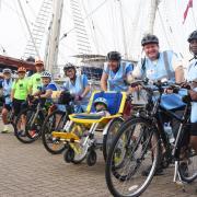 The cyclists ready to set off for London in their race with the tall ship, SV Tenacious at Great Yarmouth. From left, Graham Strudwick; Lauren Bean; John Churcher; Sara Fleming; Ruth Taylor; Tim Taylor; Gary Pegler; and Caroline Bogyere.