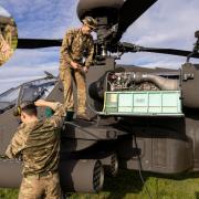 Lance Corporal Jude Webster works on Apache attack helicopters