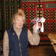 Church warden Wendy Betts with one of the angels