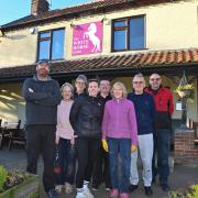 Staff and volunteers outside the White Horse pub in Upton ahead of its relaunch on January 13.