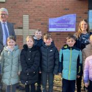 Richard Cranmer, CEO of St Benet's MAT, and Rebecca Clarke, executive headteacher of Acle St Edmund and Little Plumsted CofE Primary Academies, with school pupils