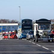 The first vehicles to cross the new Herring Bridge in Great Yarmouth.