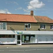 A developer has been given permission to build four new apartments behind the Well Pharmacy on The Street in Acle.