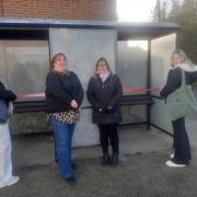 Left to right: Sadana Sriharan, Debbie Whitehead (landlady at the King's Head), Jenny THompson (Filby Charity Send Shop) and Sophia Cullen at the new bus shelter in Filby.