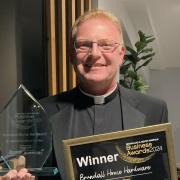 The Reverend Andrew Bevan has won retailer of the year at the at The Broadland and South Norfolk Council Business Awards.