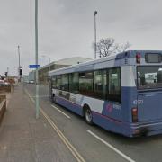 A bus approaches traffic lights at the junction of Southtown Road and Boundary Road in Great Yarmouth.