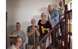 (L-R) Rosy Rose, Mark Porter, Ian Kennedy, Tina Davey, Suzanne Webb and Karen Day are helping do up a rundown house to home Ukranian refugees.